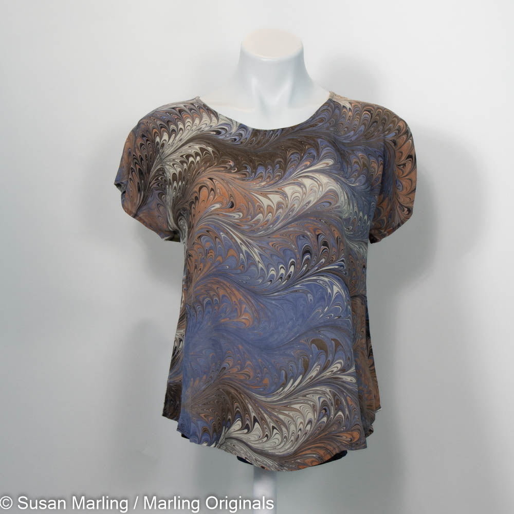 short sleeve round neck top in hand marbled earth tones of soft brown, tan, grey, cream