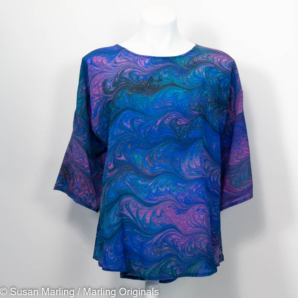 round neck silk top in rich blue, teal and violet feathered marbled pattern