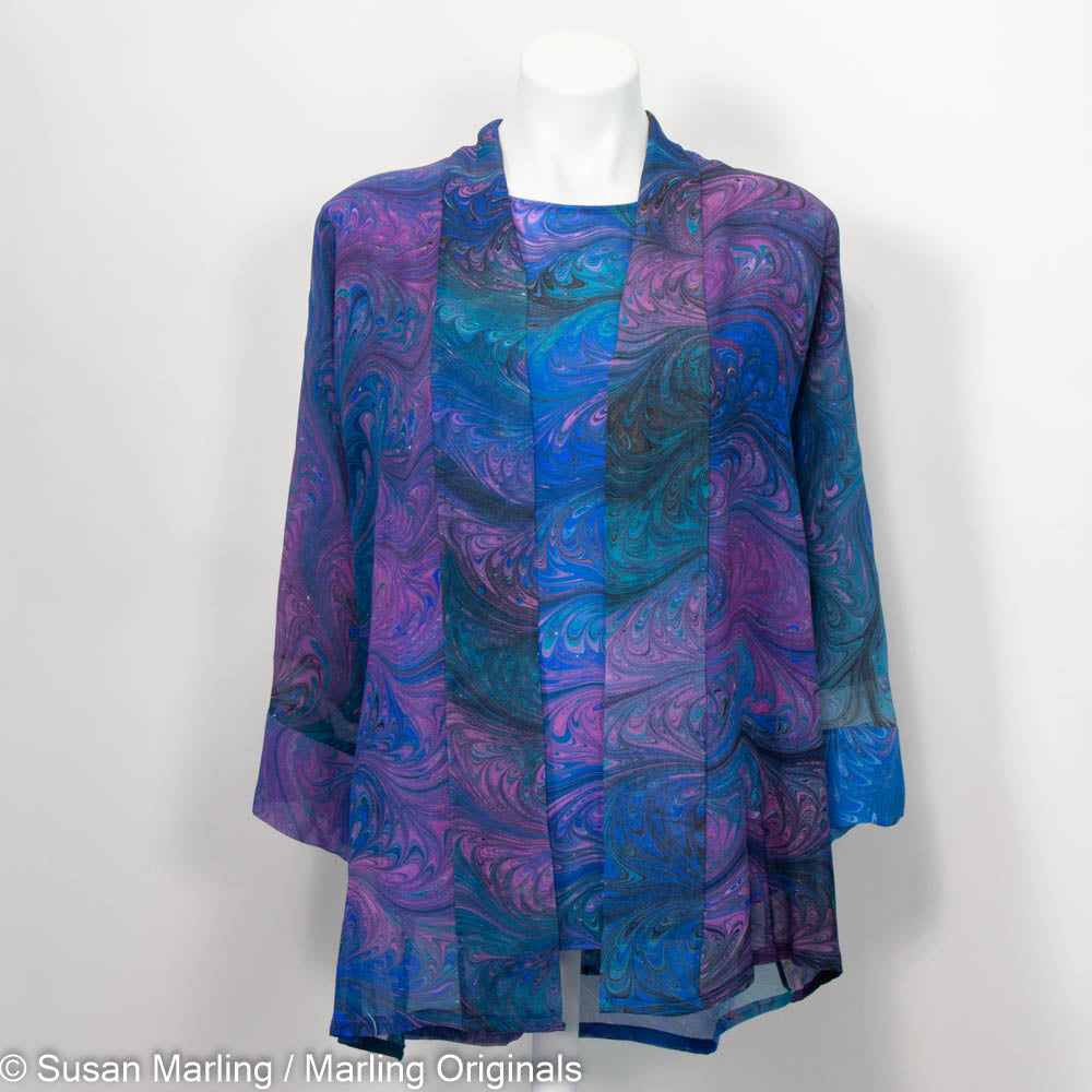 jacket set in rich teal, blue and violet in a distinctive feathery marbled pattern