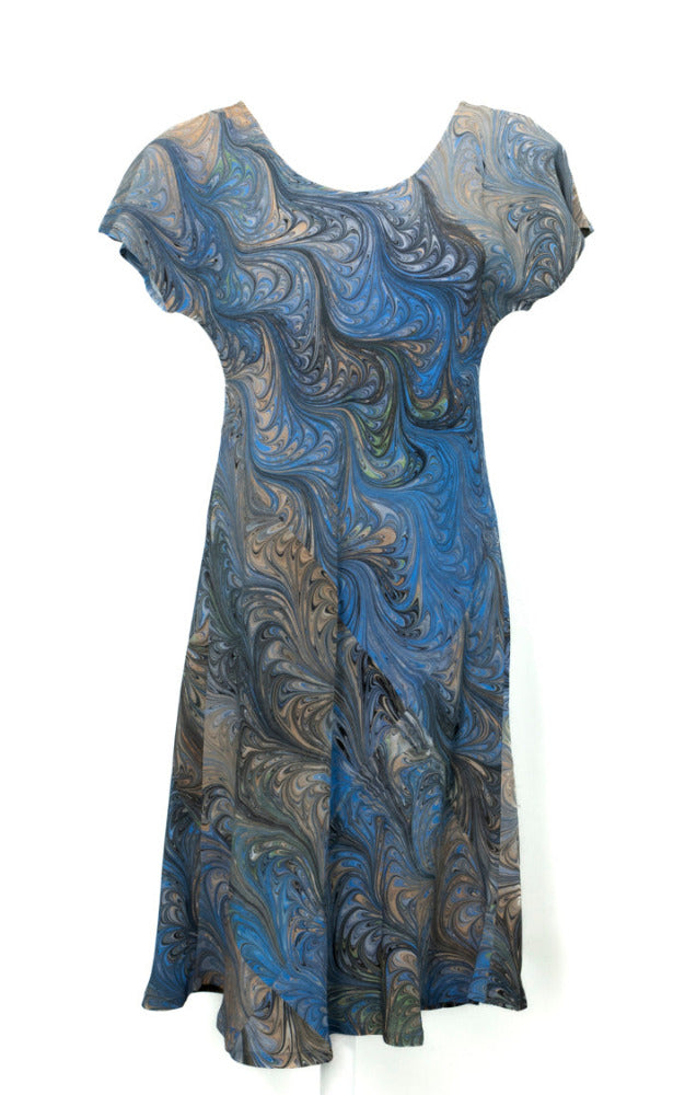 Blue and gray marbled silk bias cut dress on a white background