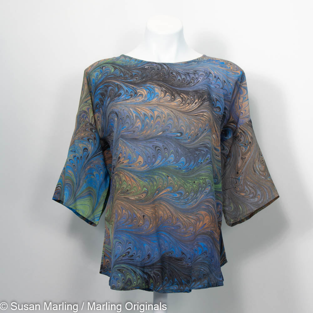 Half sleeve round neck blouse with hand marbled design in greys, blue, peach and black
