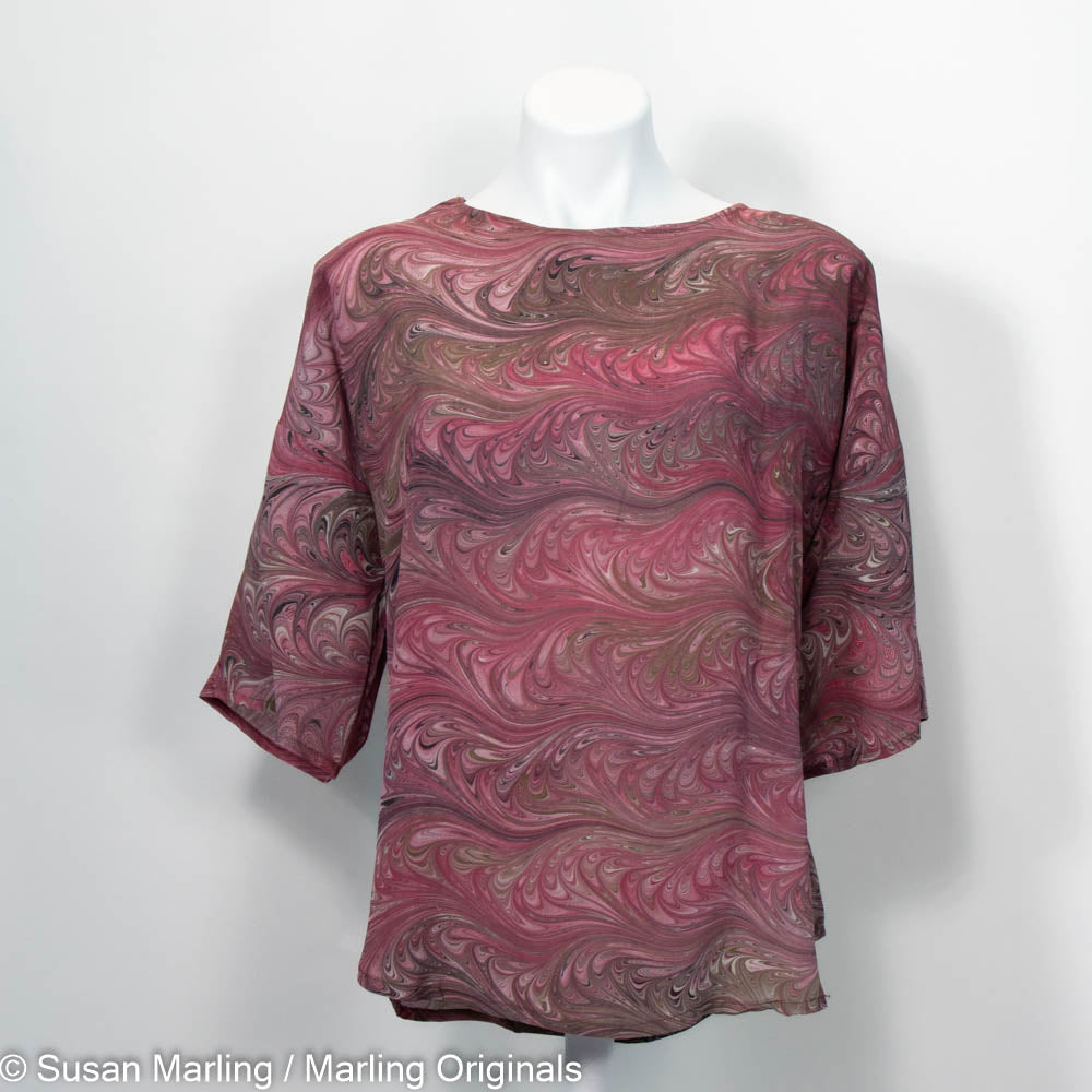 hand marbled round neck blouse in tones of cranberry and browns.  Half sleeve.