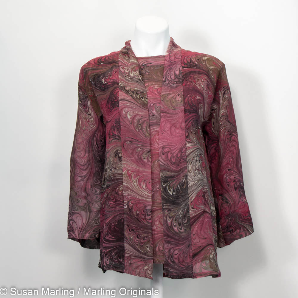printed jacket with round neck shirt.  Marbled in feathered pattern in cranberry and brown tones