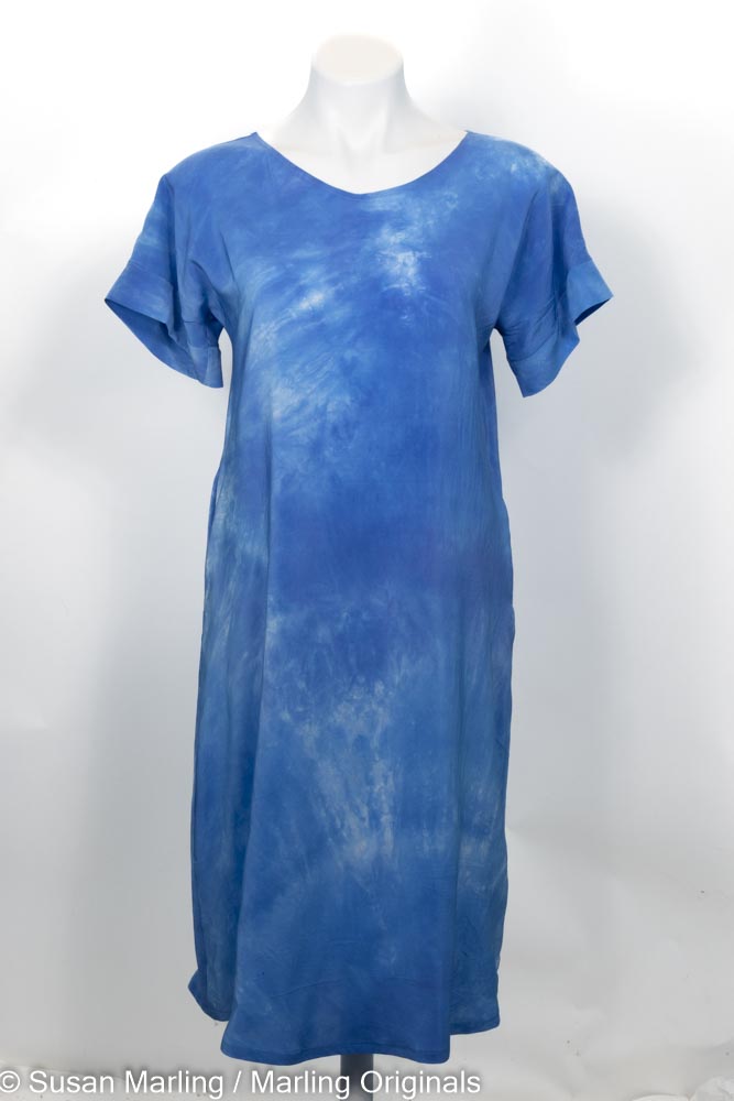 blue hand-dyed silk dress with mottled pattern.  Round neck. Short sleeves