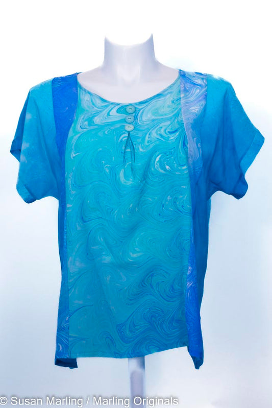 turquoise silk top with marbled aqua front. Short sleeves. Round neck