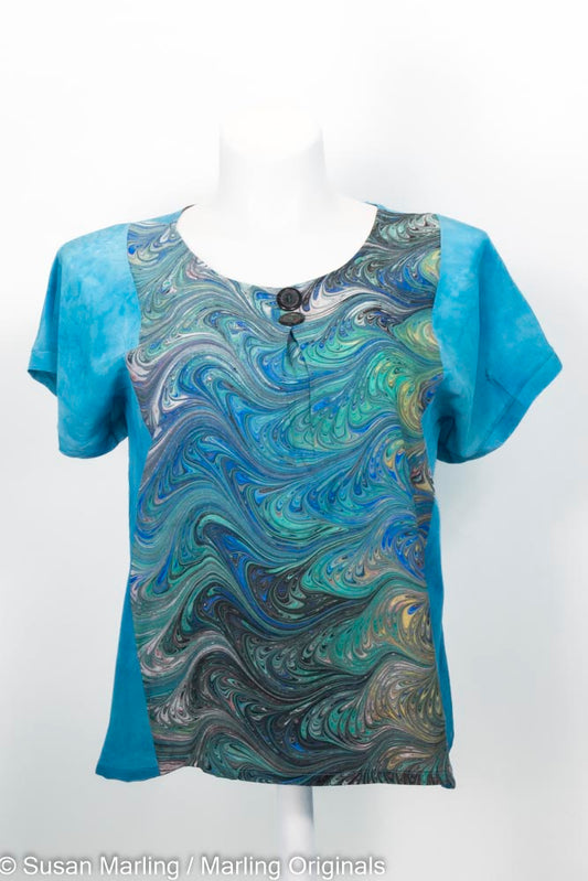 medium jade silk blouse with vibrant marbled inset.  round neck. short sleeves