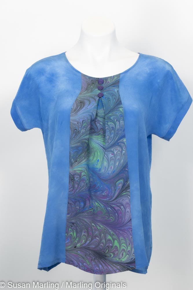 blue silk top with marbled inset pleated center round neck