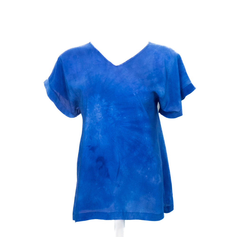 Blue hand dyed silk  t-shirt on a white background