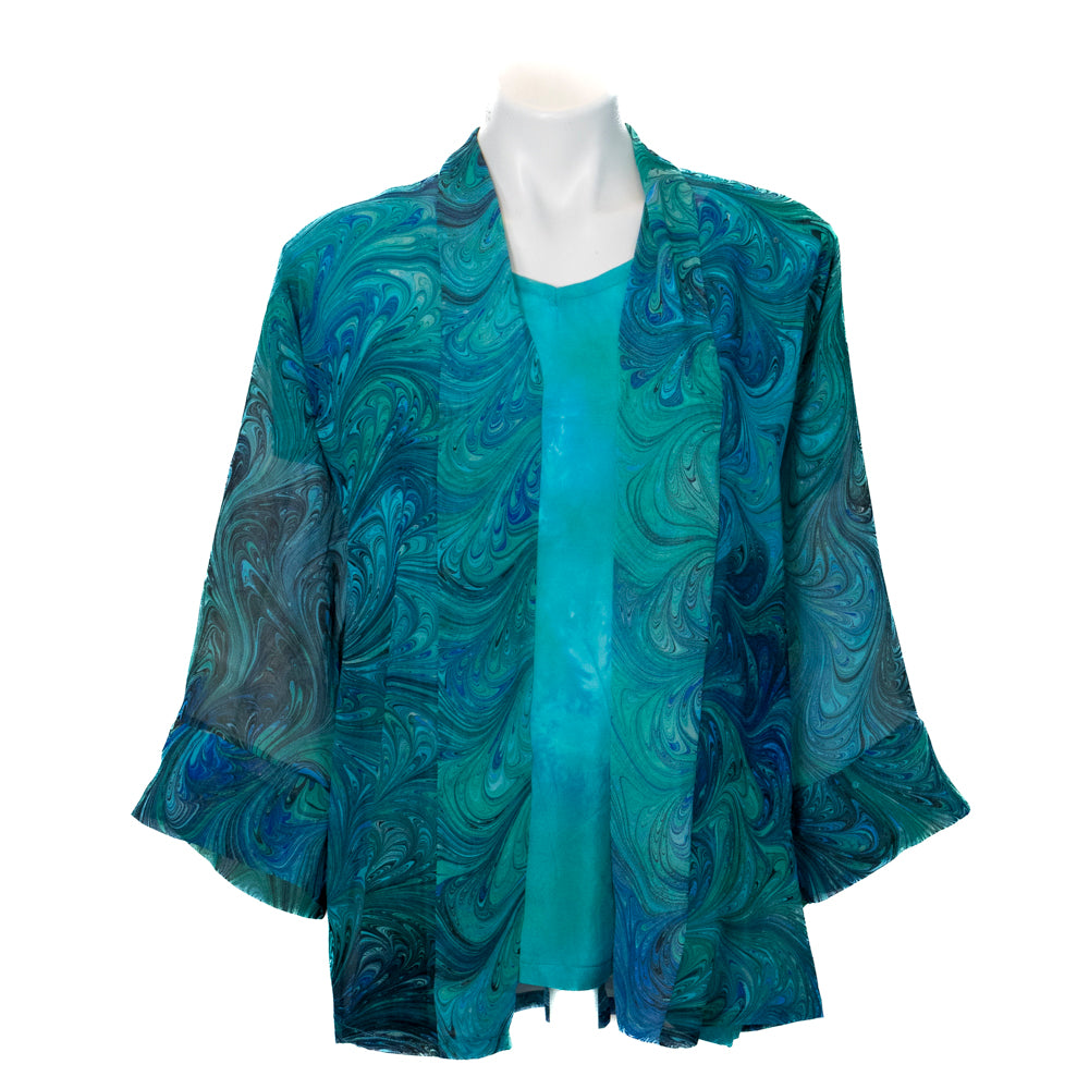 Shot of marble silk kimono over Jade green Silk top auto mannequin against the white background