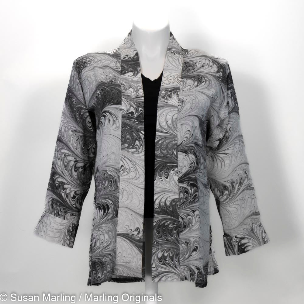 marbled silk swing jacket with front cuff.  Pattern on deep charcoal and white.