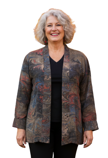 Woman  wearing a marbled silk swing jacket in brown tones