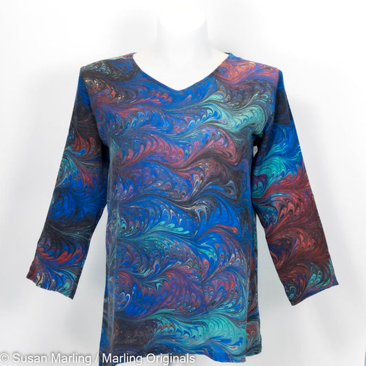 marbled silk top in tunic length.  Blue with red, yellow, green in feathered pattern