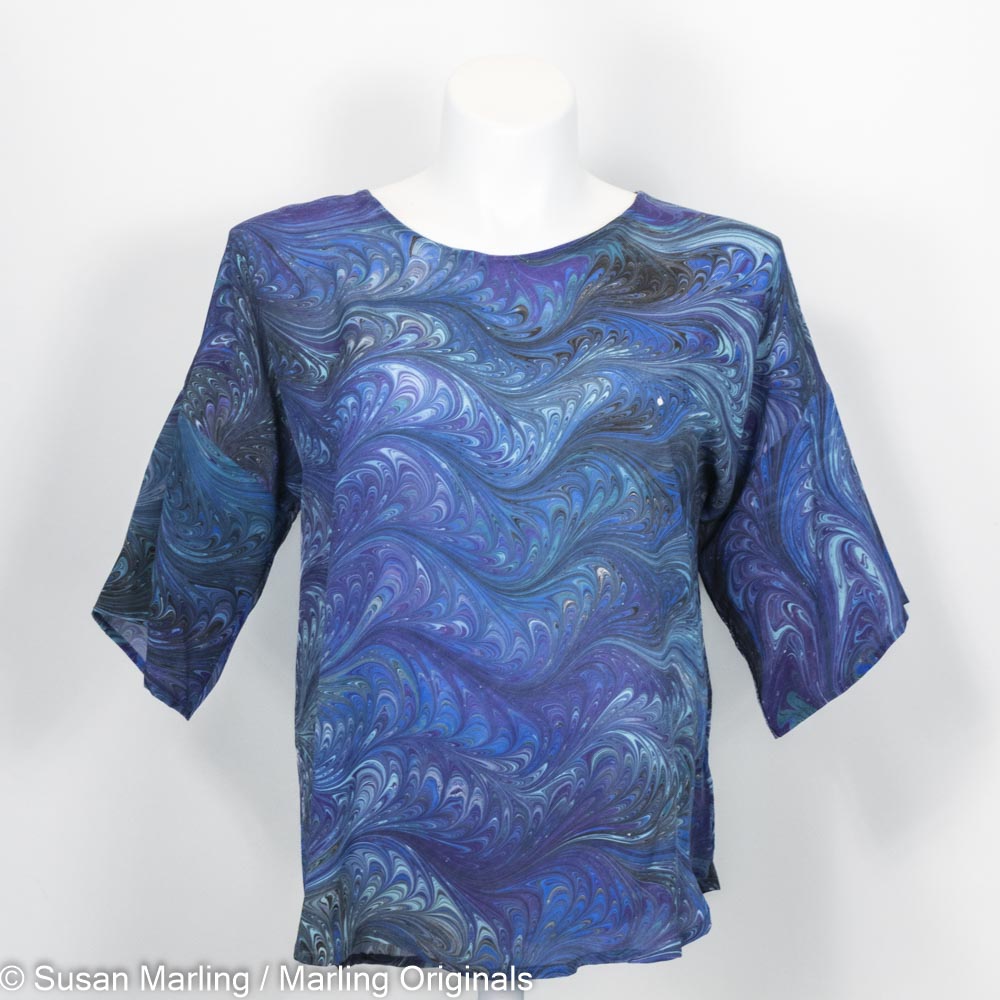 marbled silk blouse with round neck and half sleeves.  Blue, black, aqua and black pattern