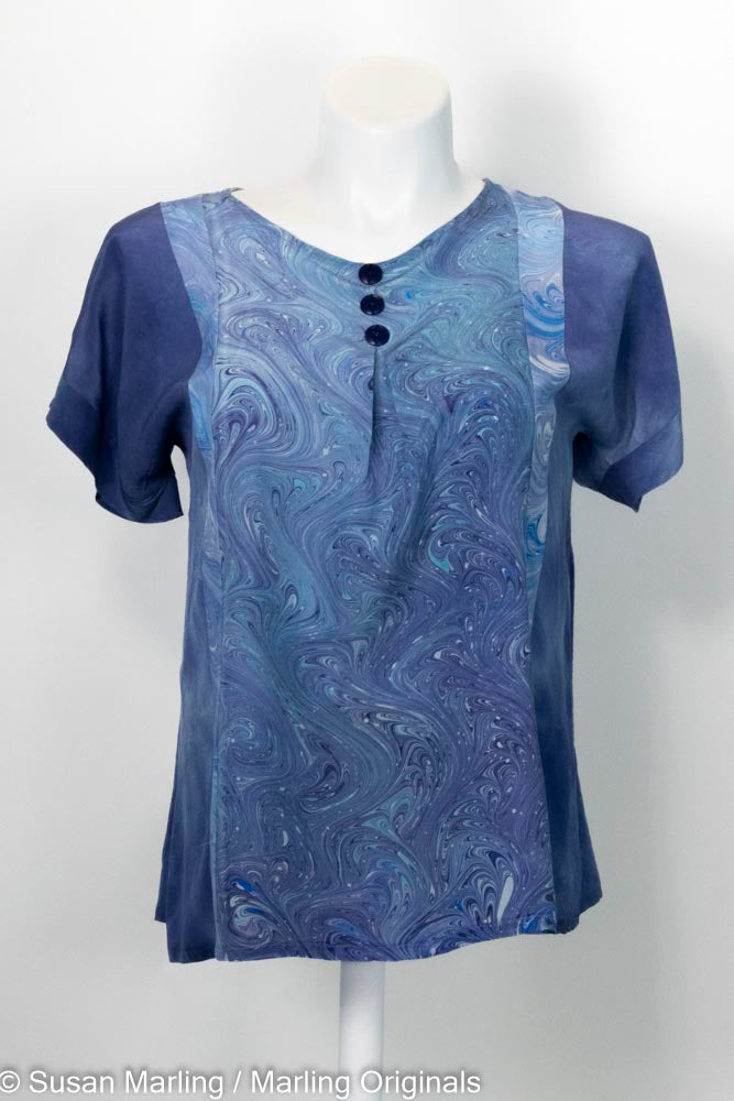 silk blouse dyed in a denim blue tone with marbled inset of blue and teal tones