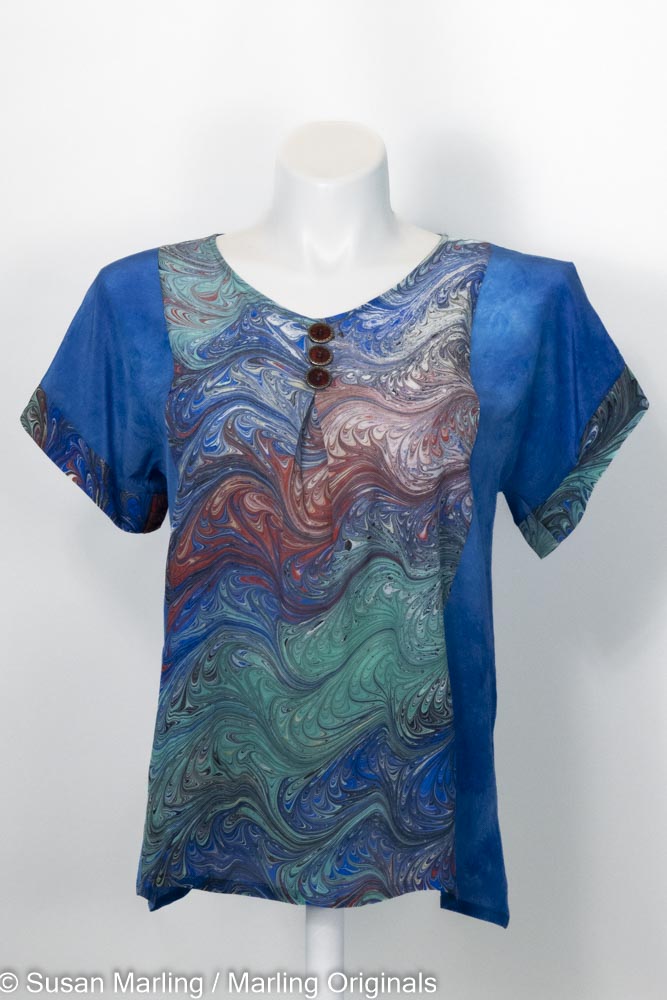 Silk blouse dyed blue with marbled inset in vibrant blue, green, red, white