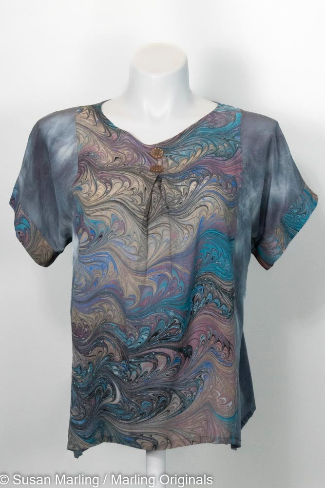 Silk blouse in dyed grey with a marbled silk inset with center pleat and buttons