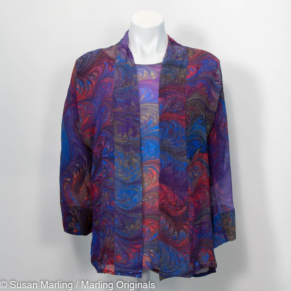 Jacket set features round neck top with sheer kimono.  Hand marbled pattern.