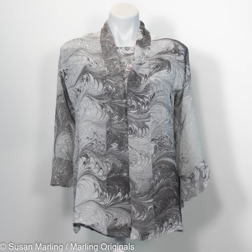 Black, grey and white marbled jacket set with sheer kimono and round neck blouse.