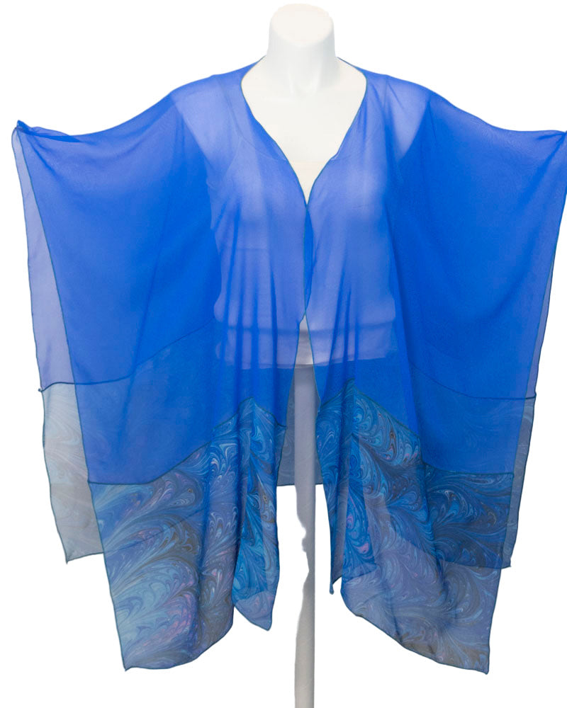 Blue sheer scarf on a mannequin against a white background