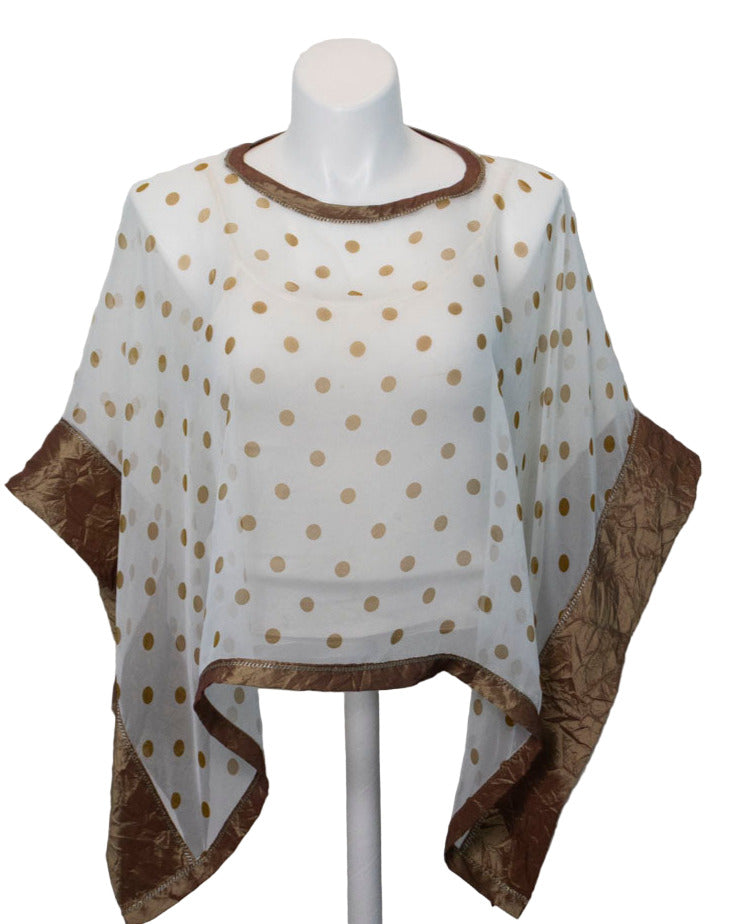 white and gold dot poncho with gold banding