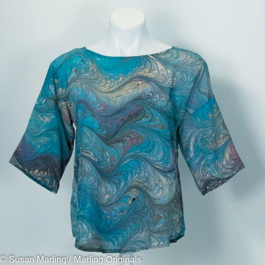 marbled silk blouse in teal, tan and mauve with round neck and half sleeves