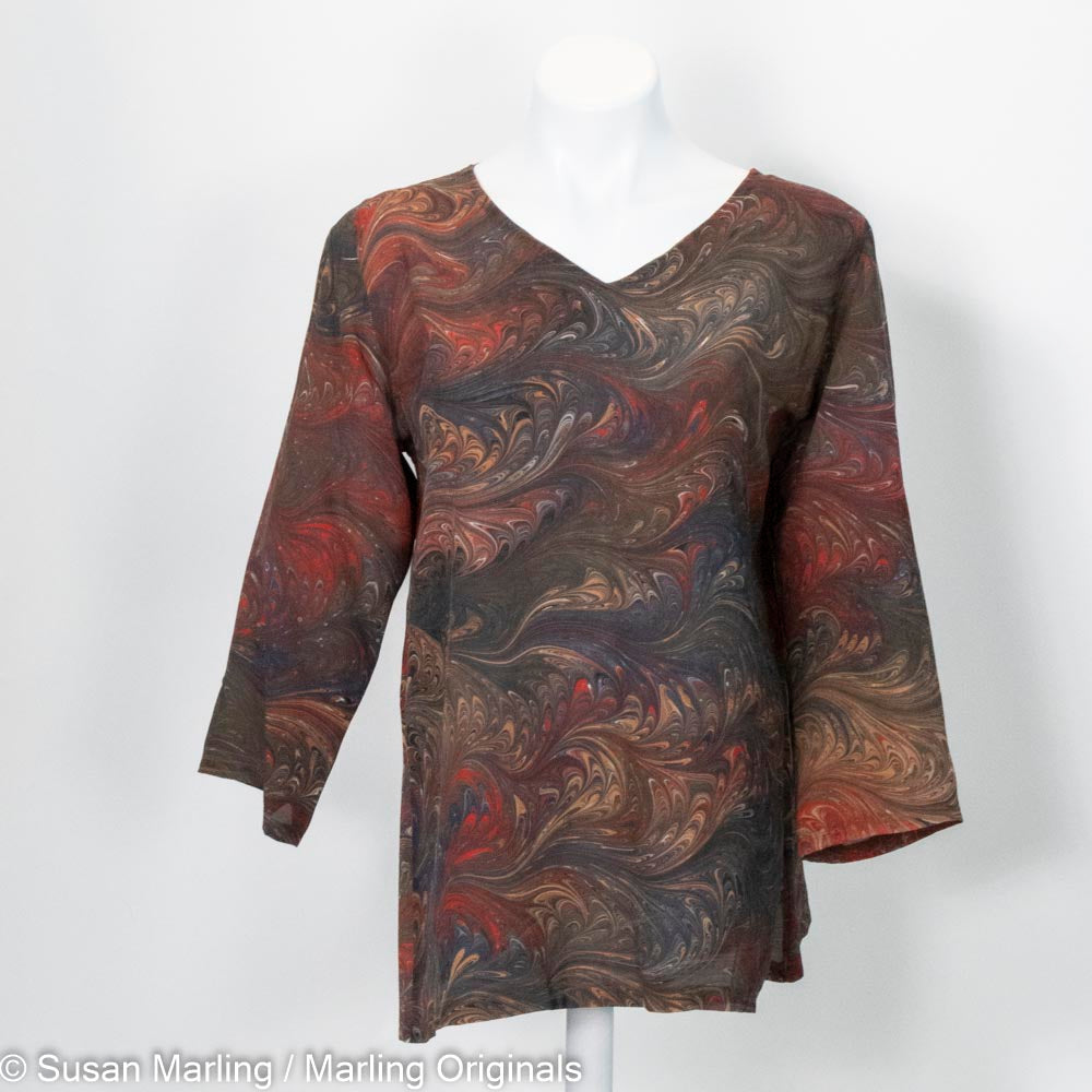 marbled silk tunic with v neck and 3/4 sleeves in rich brown with red and navy accents