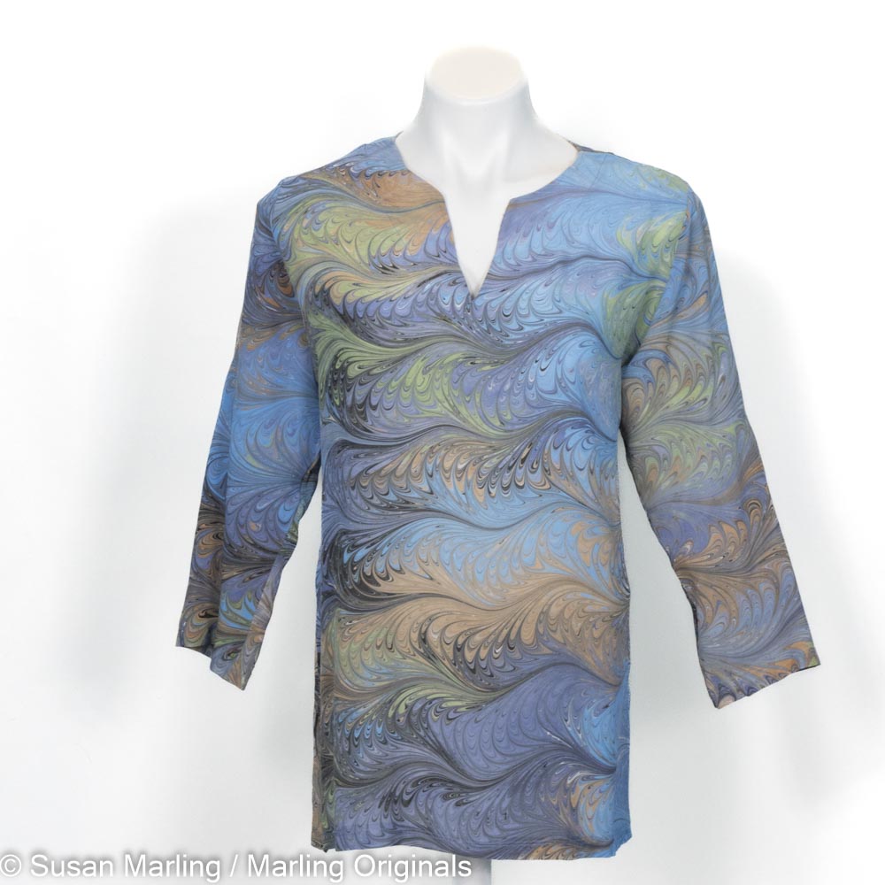 silk tunic with notch neck and 3/4 sleeves marbled in feathery pattern of blue, grey, peach, celery