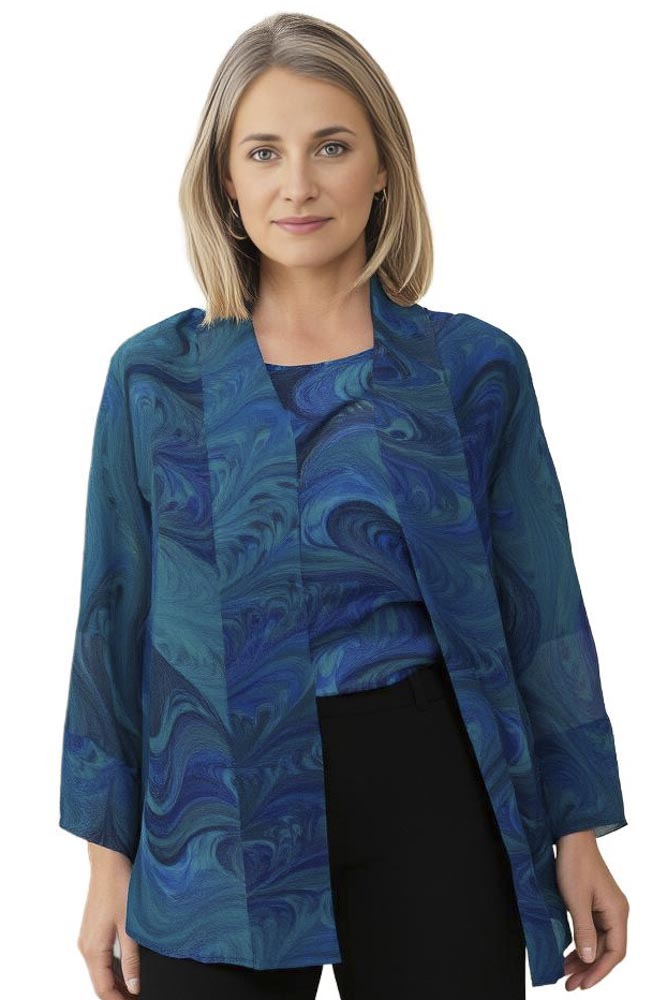 woman wearing sheer marbled silk jacket with matching top 