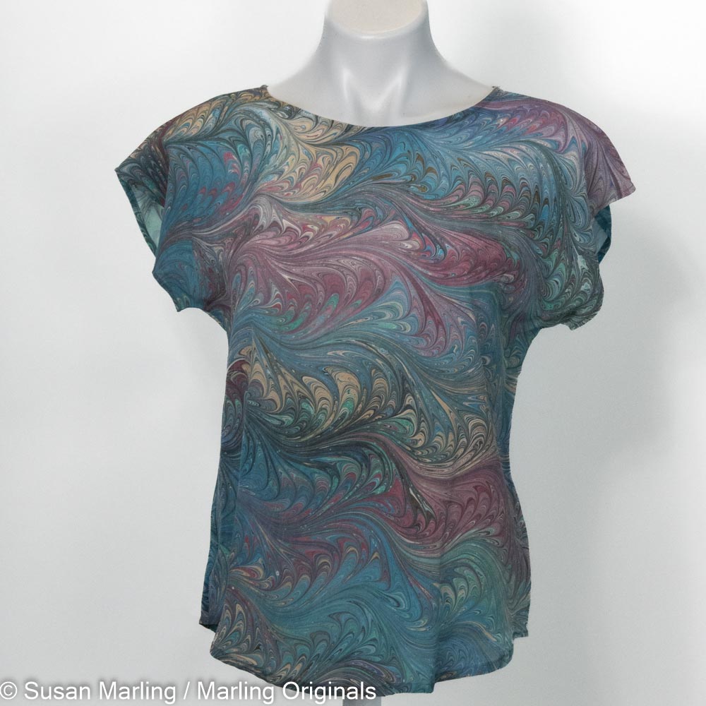 short sleeve marbled silk blouse in teal, mauve, and tan