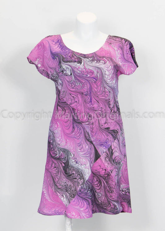 marbled dress cut on the bias in bright pinks, black and white