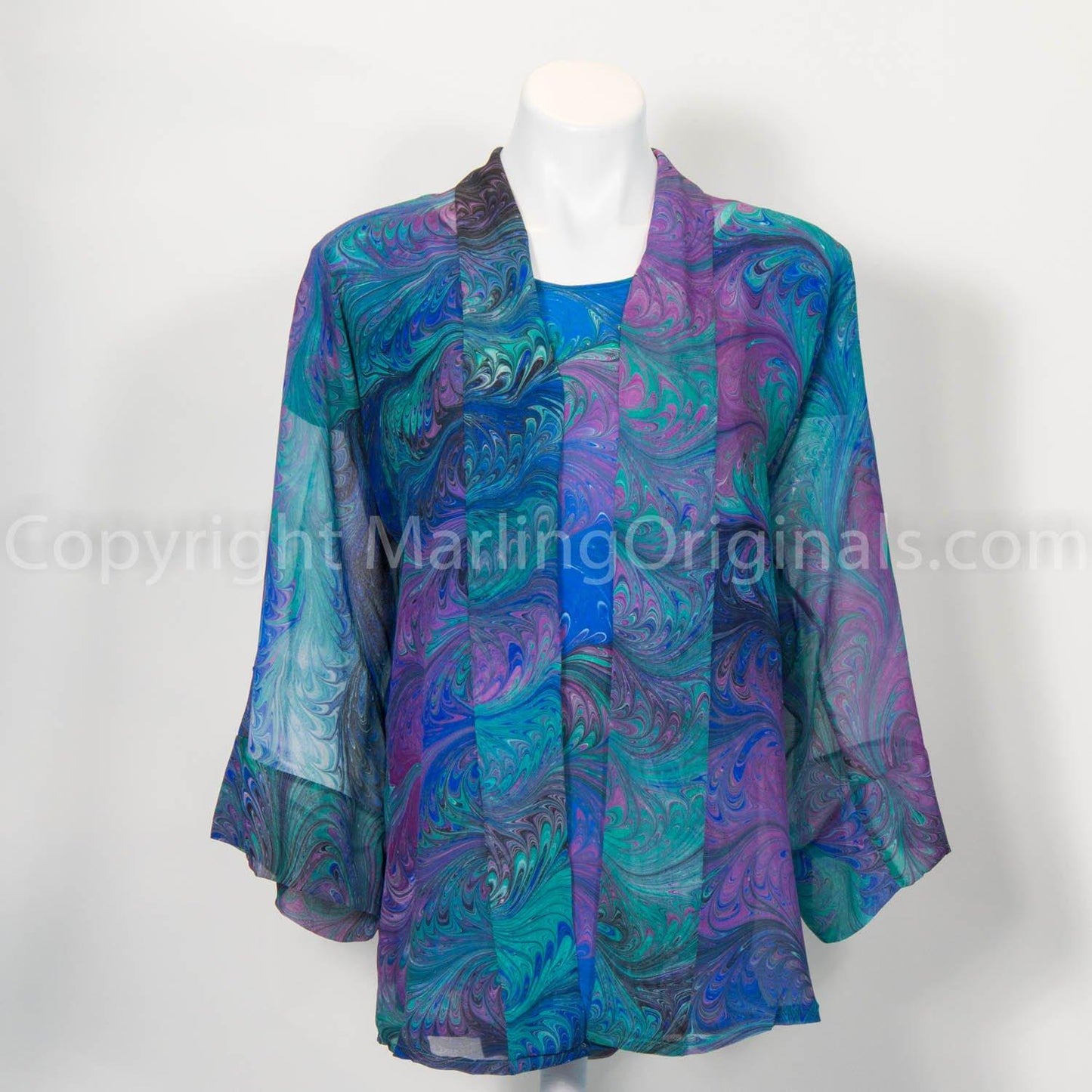 hand marbled silk kimono jacket in blue, violet and green. Shown with matching silk top