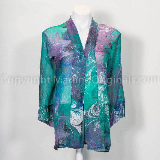 Hand marbled sheer kimono in green, blue, white and violet.  Banded cuff and front.  One size.