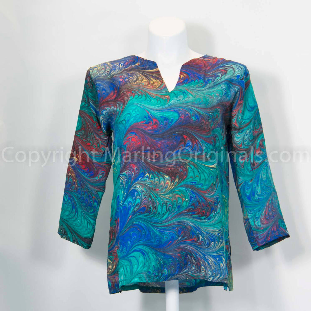 Marbled silk classic tunic top in blue, green, red, black  Long sleeves, notched neck, side slits.