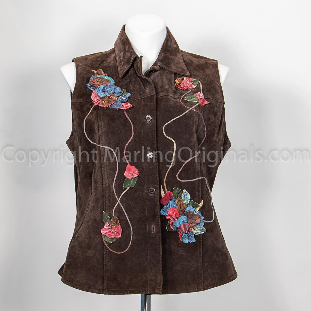 Front of Chocolate brown leather jacket with floral design embellishments