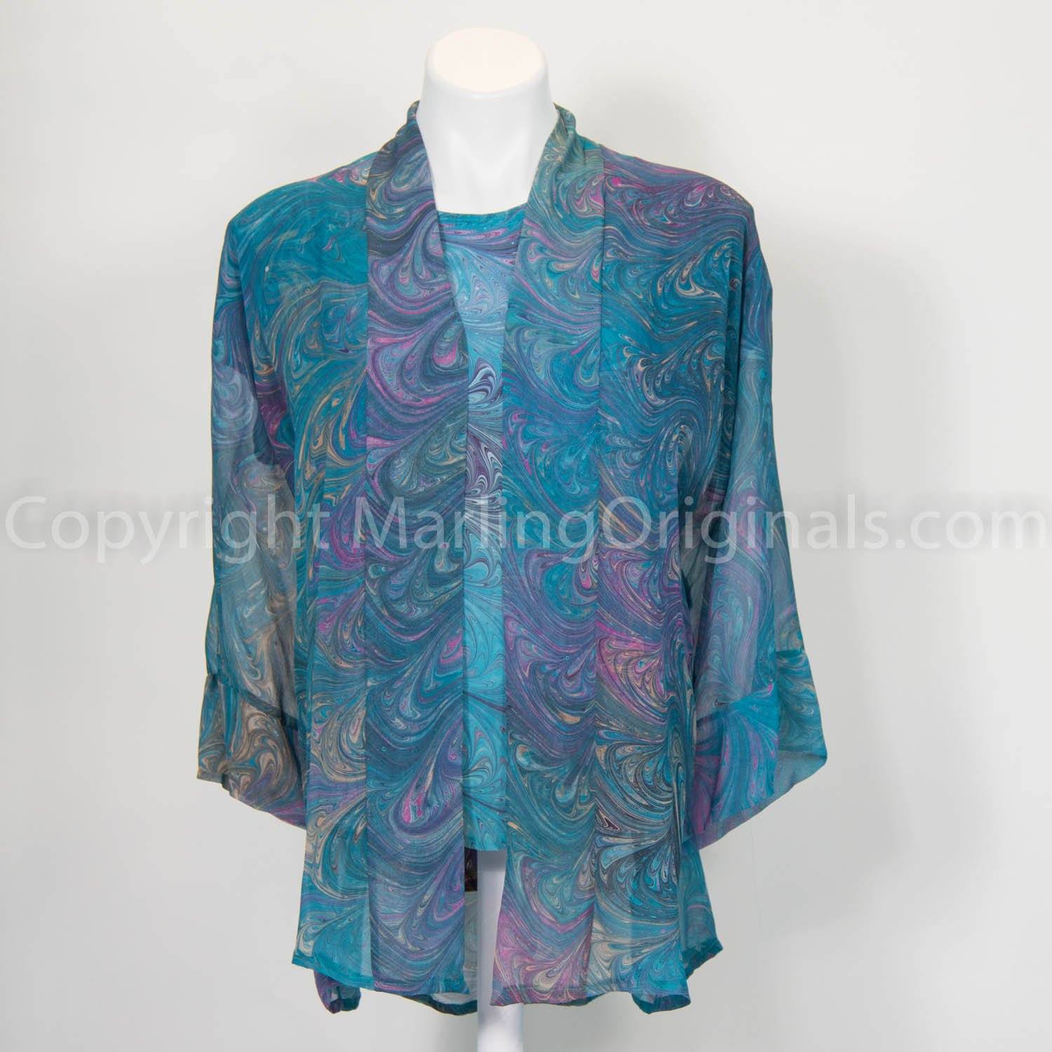 marbled chiffon kimono jacket shown with matching blouse. Teal, pink, gold tones.