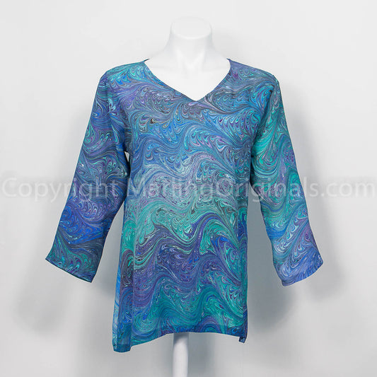 marbled silk crepe tunic with feathered pattern in blues, greens and purple