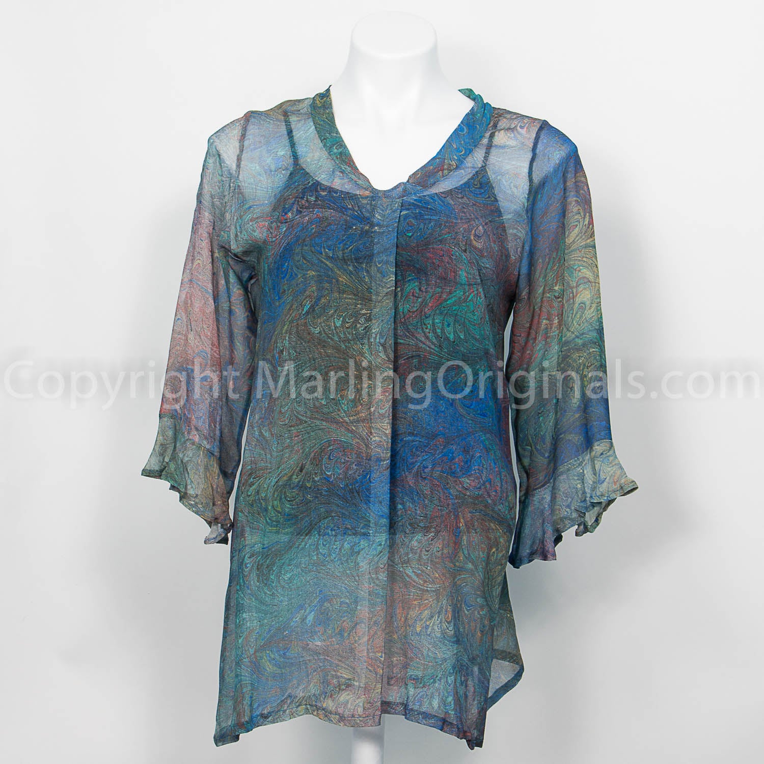 sheer double marbled silk tunic.  V neck with pleat in front.  greens and blues