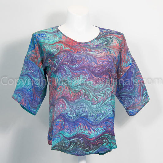 marbled silk top in shades of purple, red, green, blue.  Half Sleeves, round neck