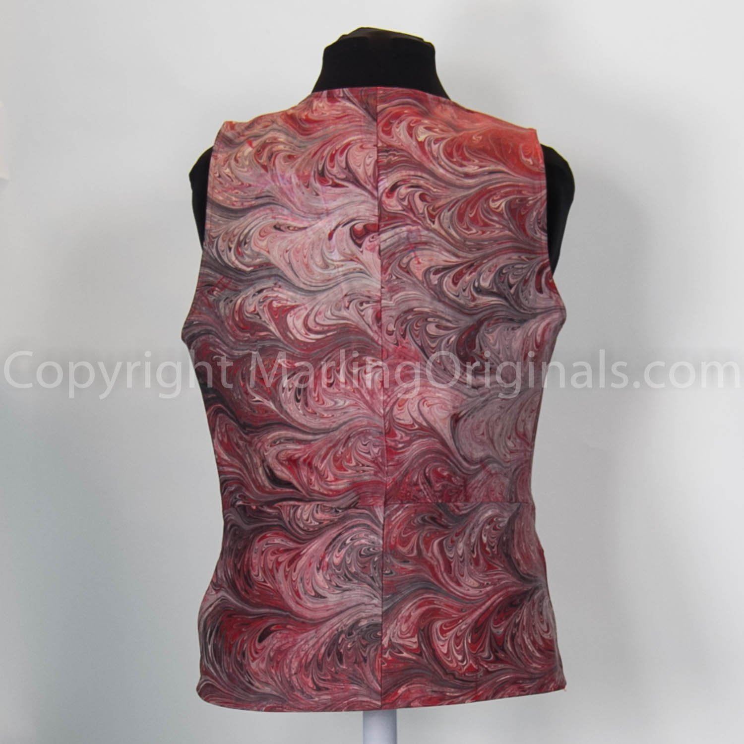back of marbled leather vest in red, black, white