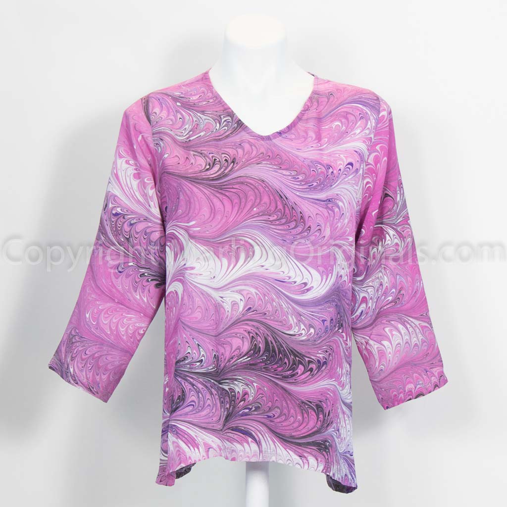 Vivid pink marbled silk tunic with black and white accents.