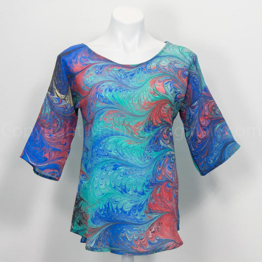 hand marbled spring top in vibrant primary colors. Round neck with half sleeves.