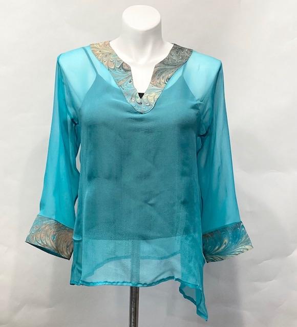 sheer silk tunic in aqua with decorative marbled neckline and cuff 