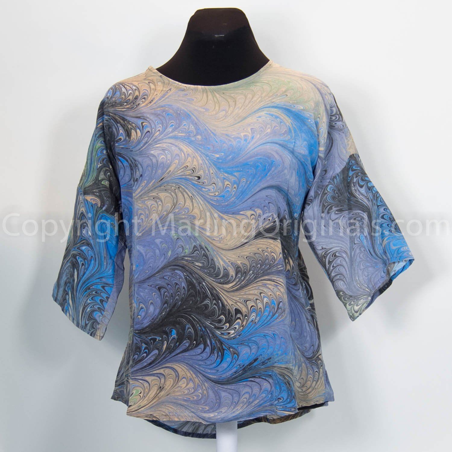 marbled silk top in grey, blues and peach colors.  Round neck, half sleeve, flattering cut.