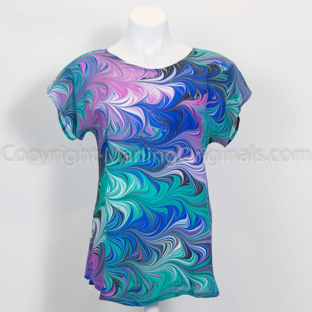 Hand marbled silk top in blue,green,violet,black,white.  Short sleeve, round neck.