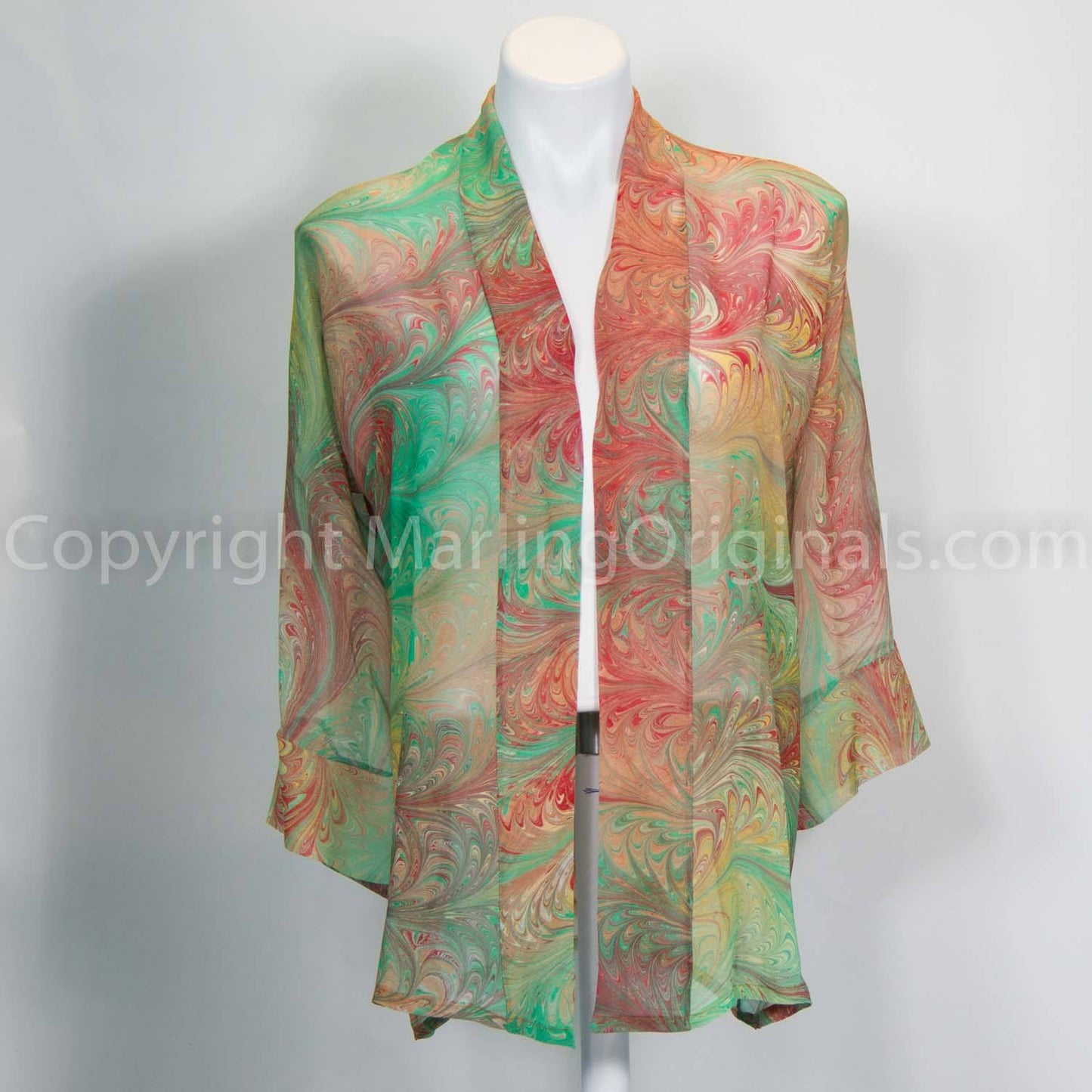 Hand marbled silk kimono in spring green, red, sienna and gold.  Sheer jacket has banded front.